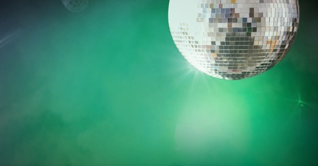 disco ball party with green smoke mist