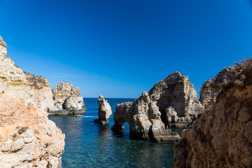 Fototapeta premium Beautiful cliffs of Ponta de Piedade, Lagos, Algarve region, Portugal 