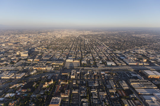 Afternoon aerial view of streets and buildings south of downtown Los Angeles in Southern California.