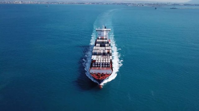 Large container ship at sea - Top down Aerial footage