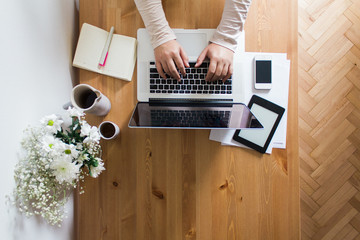 Woman working alone at home