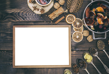 wooden frame and wine mulled wine with ingredients