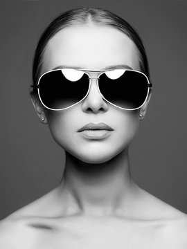 beautiful young woman in sunglasses