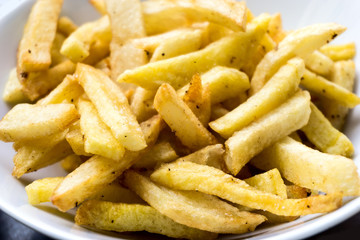 Golden French fries potatoes ready to be eaten