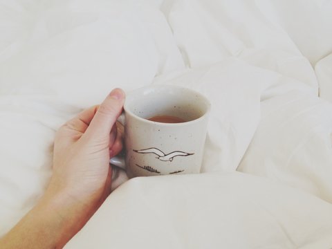 Having a cup of tea in bed