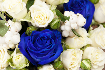 Bouquet of different flowers, roses, carnations, gerberas, sunflowers, irises..