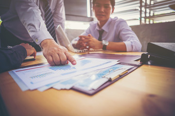 business teamwork discussing ideas and planning about profits summary at meeting room 