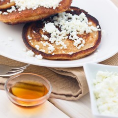 Homemade gluten free pancakes with cottage cheese  and honey