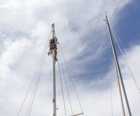 Rigger in a sailboat mast
