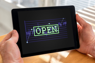 Open stock market concept on a tablet