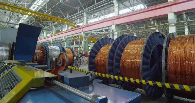 Industrial cable production. Winding the cable onto the reel.