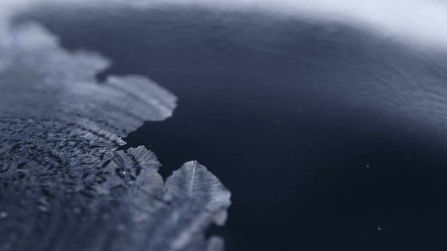 Freezing soap bubble close-up, winter holidays background,