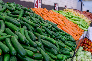 Close up Fresh vegetables at the counter of the vegetable shop, farmer marketplace. Organic, healthy, vegetarian diet food concept. Selective focus