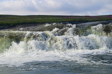 Arctic, Vaigach Island, waterfall in the polar tundra