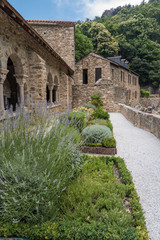 Fototapeta na wymiar Garden in the Romanesque Abbey of Saint Martin du Canigou