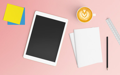 Modern workspace with coffee cup, blank paper and tablet copy space on pink color background. Top view. Flat lay style.