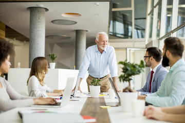 Business people discussing a strategy and working together in office