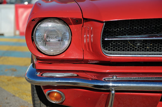 American muscle car. Head light detail