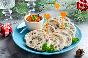 Chicken roll (roulade) with omelet (omelette) and mushrooms