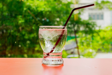 water glass on nature background.