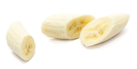 Three peeled banana slices isolated on white background