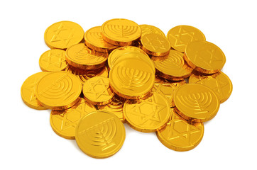Image of jewish holiday Hanukkah with gold chocolate coins isolated on white