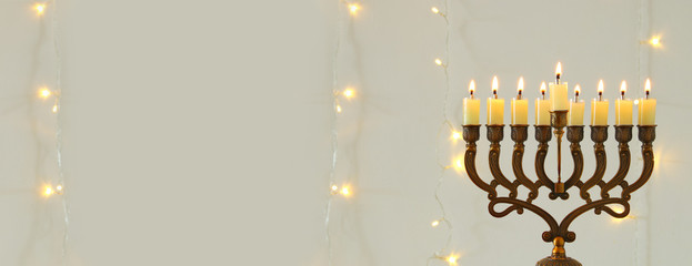 image of jewish holiday Hanukkah background with menorah (traditional candelabra)