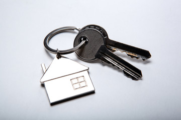 keys from the apartment with a keychain in the form of a house