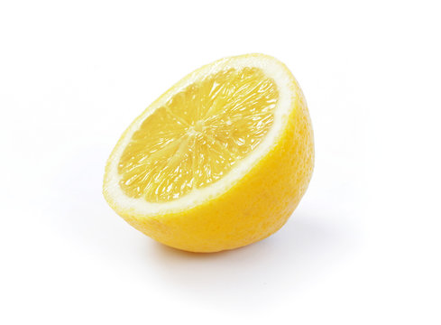 A ripe lemon cut in half