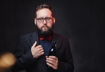 A man drinks craft beer.