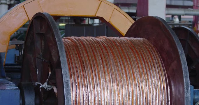 Industrial cable production. Winding the cable onto the reel.