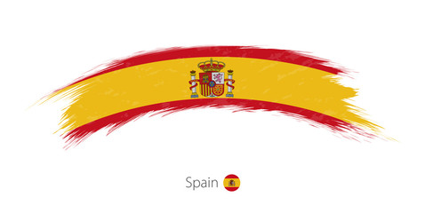 Naklejka premium Flag of Spain in rounded grunge brush stroke.
