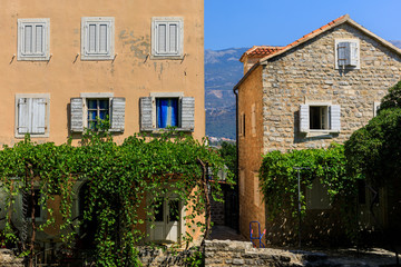 Fototapeta na wymiar Facades of the historical buildings in center of Budva, Montenegro
