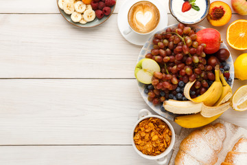 Fresh healthy breakfast with fruits copy space