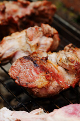 medium roasted  steak  pork on iron grill.Thailand local tradition grill pork