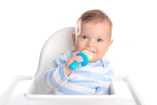 Cute little baby with nibbler on white background