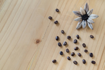 close up of Coffee beans on wood background, selective focus (detailed close-up shot)