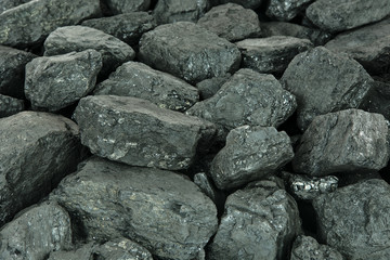 Fototapeta na wymiar Concept of energy fuel - black coal in close-up as a texture or background