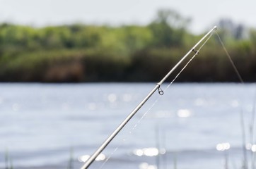 fishing rods on water
