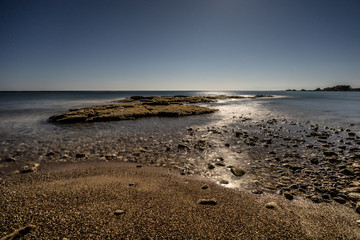 night long exposure photo of sea from the beach