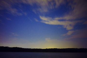 Fototapeta na wymiar stars at night in the forest