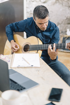 man who studied music with guitar