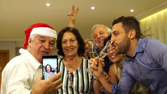 Family taking a selfie in a Christmas Day