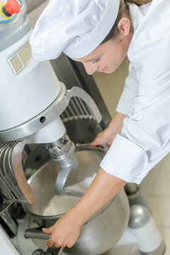 chef with mixing machine