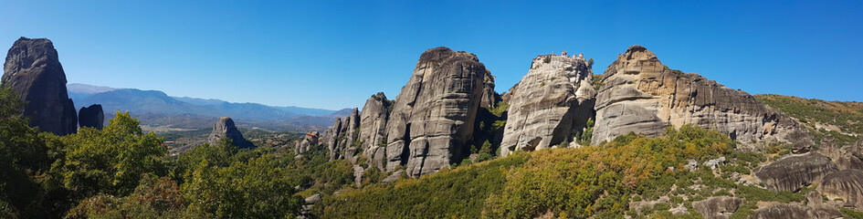 Fototapeta na wymiar Wide panoramic view of the Meteora rock monasteries in Greece