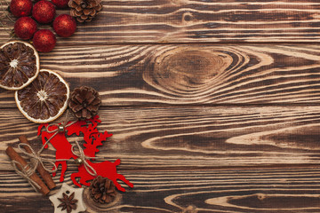 Wooden christmas background with handmade christmas tree toys