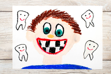 Photo of colorful drawing: Smiling boy without milk teeth.  Losing baby teeth.