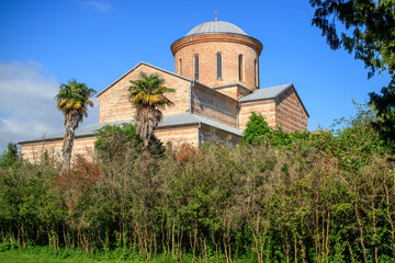 the old Church of the 4th century on the background of blue sky in pizunda