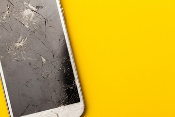 Smashed shattered broken screen of a mobile smartphone