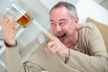 happy drunken man drinking beer